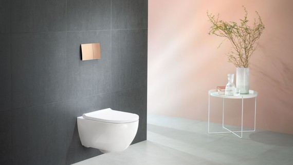 WC Geberit Acanto avec technologie de rinçage TurboFlush et plaque de déclenchement Sigma70 en or rouge WC Geberit Acanto avec technologie de rinçage TurboFlush et plaque de déclenchement Sigma70 en or rouge