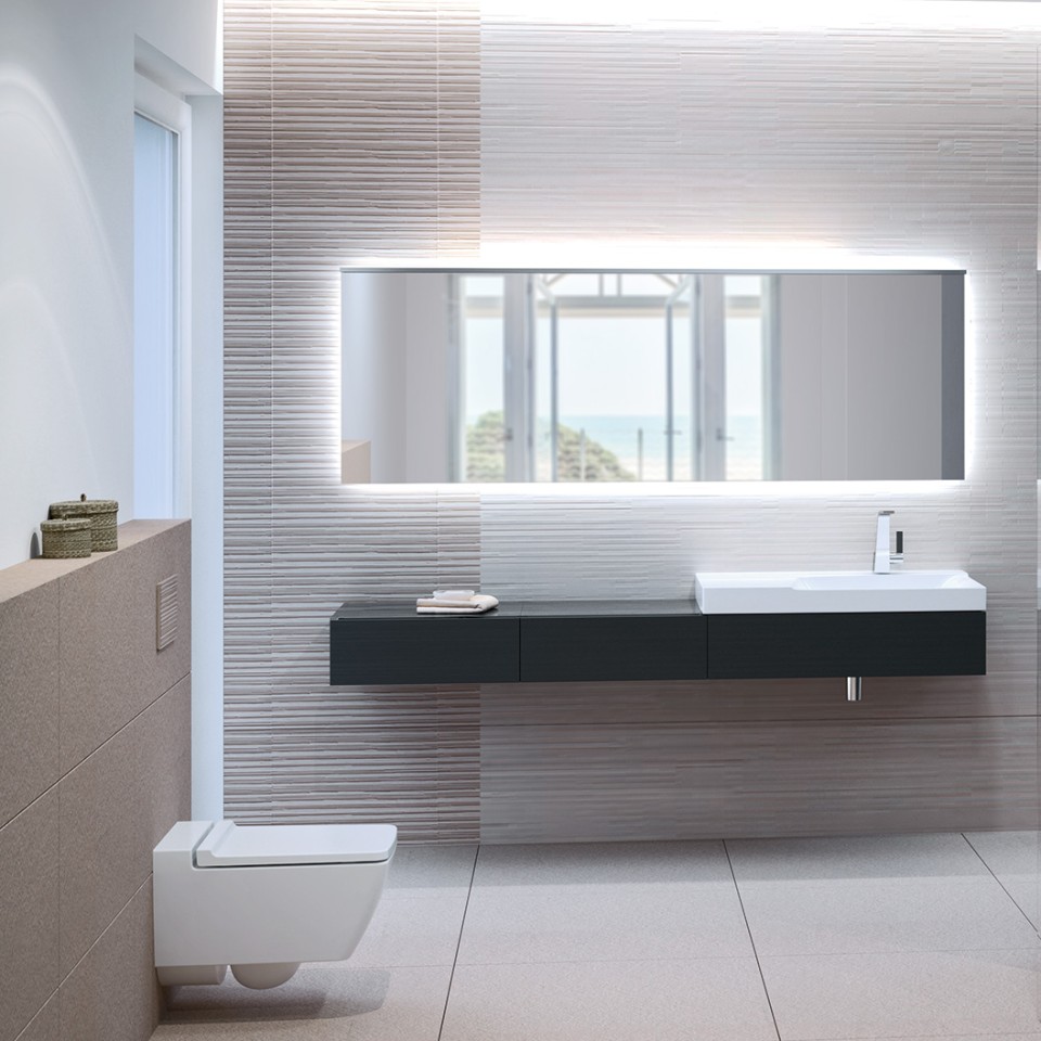 Salle de bains Geberit Xeno2 avec WC rimfree, plaque de déclenchement Sigma70 et lavabo