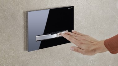 Geberit Sigma50 en verre noir avec boutons chromés