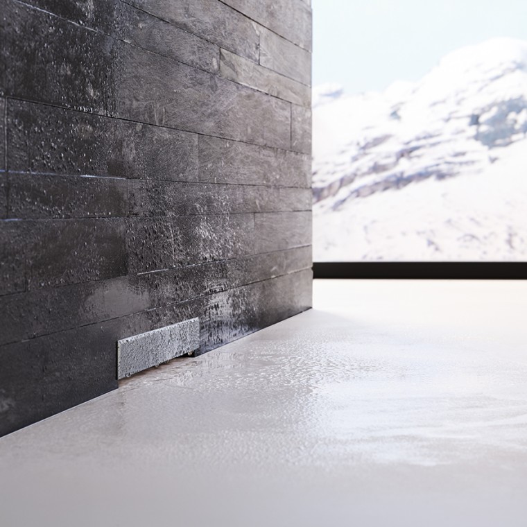 Evacuation murale Geberit dans un mur maçonné noir Evacuation murale Geberit dans un mur maçonné noir