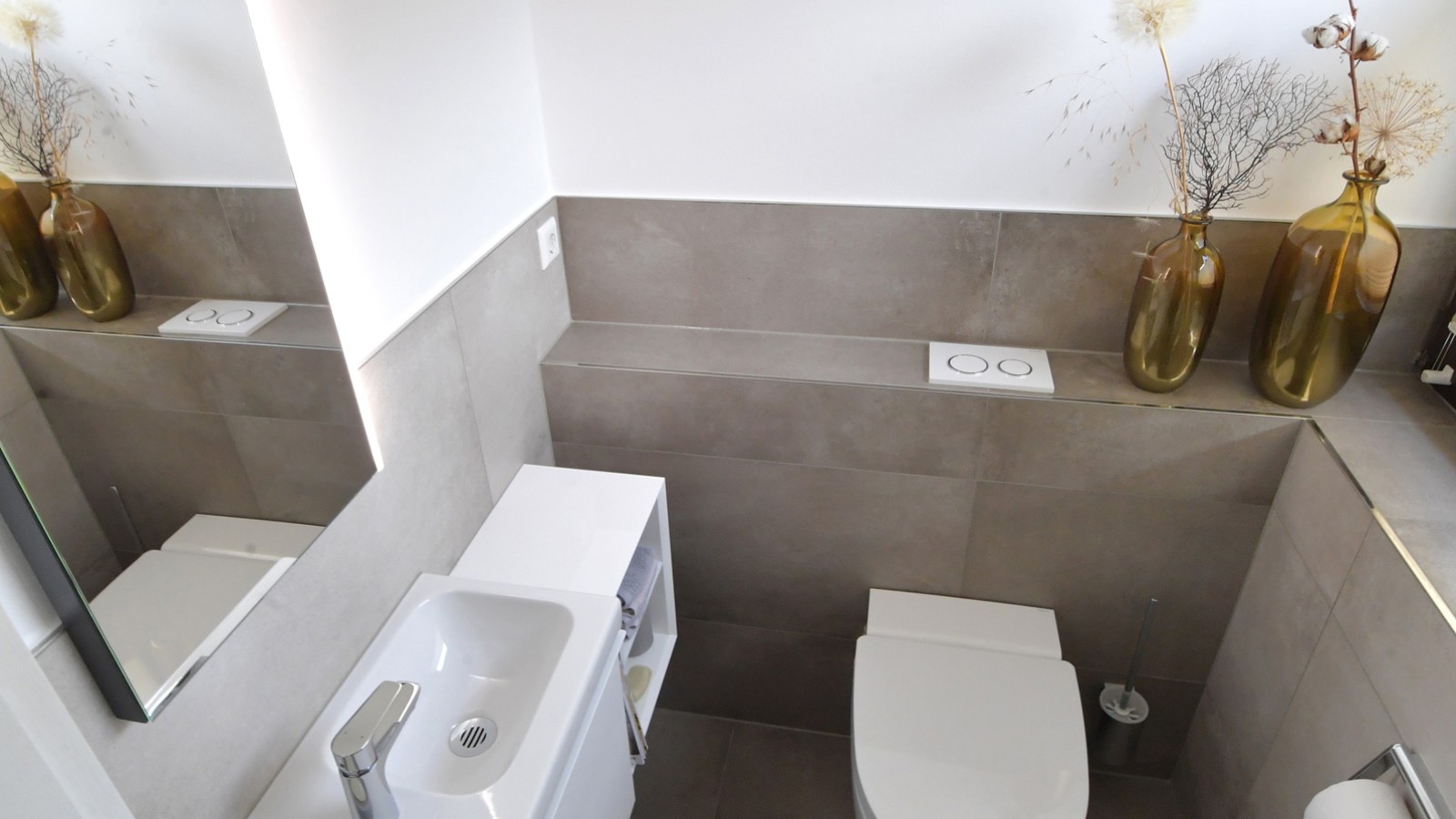 La salle de bains d'invités après la rénovation La salle de bains d'invités après la rénovation