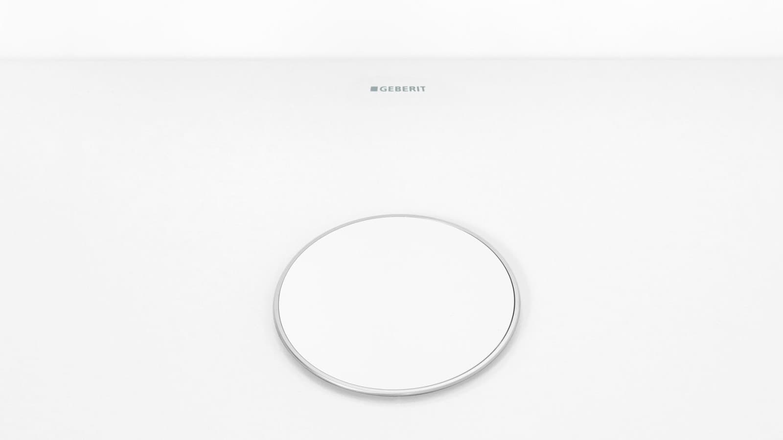 Afvoerdeksel in wit met discrete chroom rand Afvoerdeksel in wit met discrete chroom rand