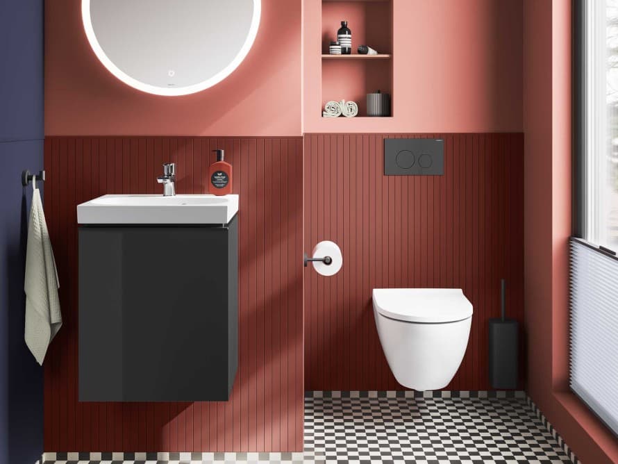 Toilettes pour invités aux chaleureux tons terre cuite, aménagées avec des produits de la collection de salle de bains Geberit Acanto. Toilettes pour invités aux chaleureux tons terre cuite, aménagées avec des produits de la collection de salle de bains Geberit Acanto.