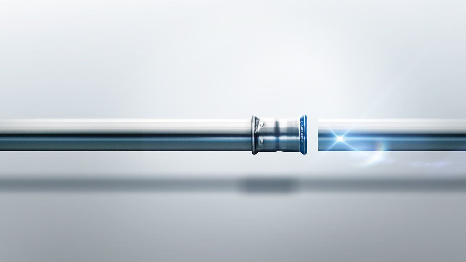 Raccord Geberit Mapress en acier inoxydable avec indicateur de pression bleu Raccord Geberit Mapress en acier inoxydable avec indicateur de pression bleu